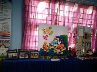 Photographs, batik, bookmarks that were exchanged with schools around the world, among many other souvenirs displayed in the Skype room.